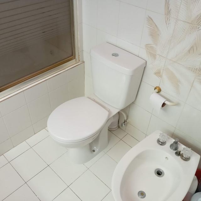 Bathroom with toilet and bidet